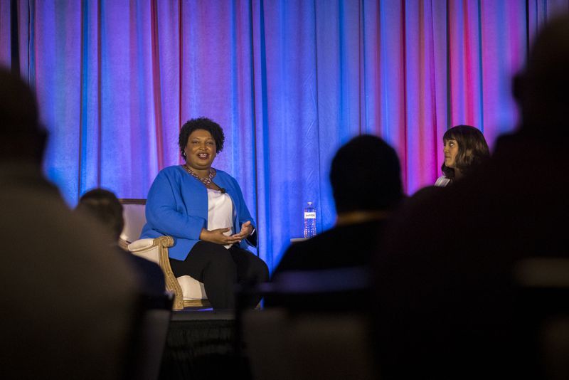 SAVANNAH, GEORGIA - JUNE 11, 2022: Gubernatorial candidate  Stacey Abrams, right, speaks during the Georgia School Board Association Summer conference in Savannah. (Stephen B. Morton for The Atlanta Journal-Constitution).