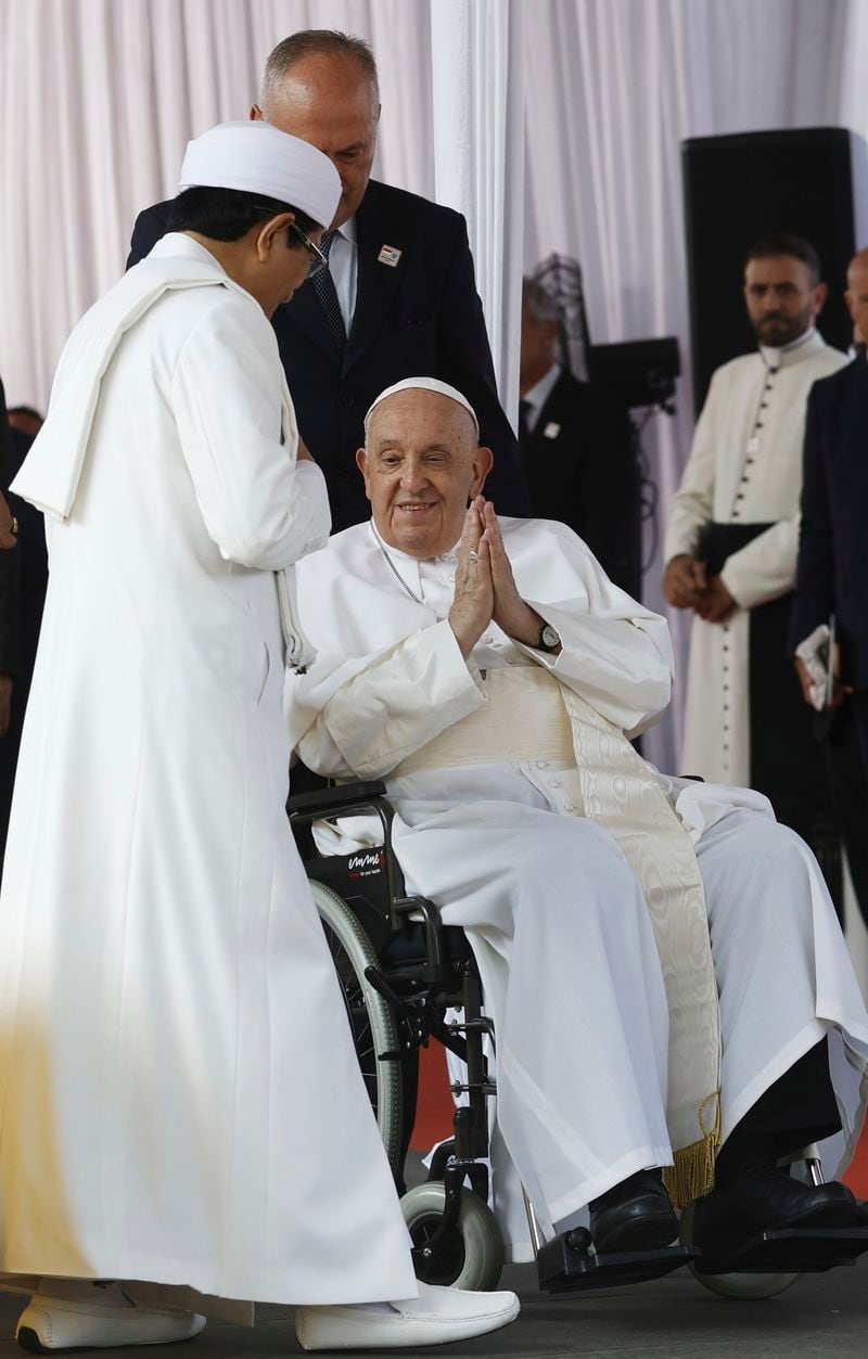 Pope Francis, center, arrives at the Istiqlal Mosque for an interreligious meeting in Jakarta Thursday, Sept. 5, 2024. (Mast Irham/Pool Photo via AP)