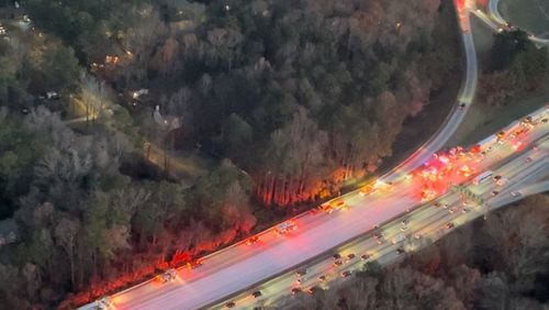 A huge chemical spill response from Atlanta Fire and GDOT shuts down I-285/northbound at Highway 166 in Southwest Atlanta on December 7, 2023. Credit: Doug Turnbull, WSB Skycopter