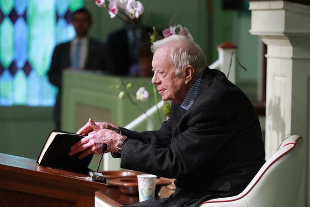 Former U.S. President Jimmy Carter, seen here at Maranatha Baptist Church when he was 94 years old, will turn 100 on Tuesday, joining a growing cohort of centenarians. Carter has been in home hospice for 19 months. (Curtis Compton/AJC file)