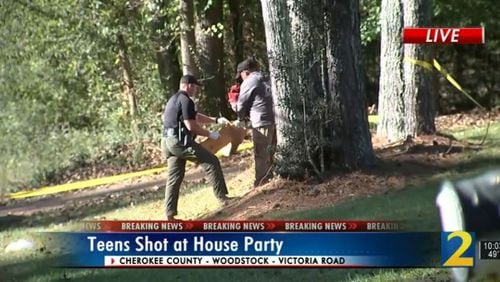 A 14-year-old is dead after gunfire erupted at a Woodstock house party Sunday morning.