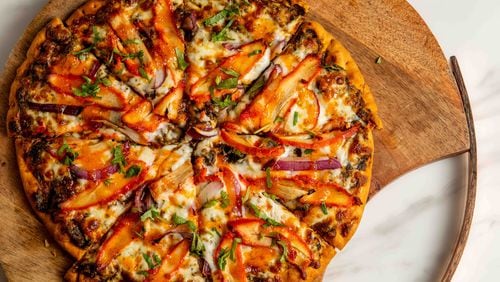 Chili paneer pizza is one of several Indian-inspired pizzas on the menu at Tandoori Pizza and Wings. / Courtesy of Tandoori Pizza and Wings