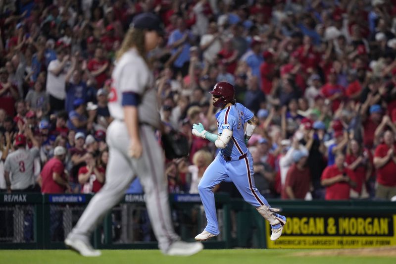 Philadelphia Phillies' Nick Castellanos, right, rounds the bases after hitting a two-run home run against Atlanta Braves pitcher Grant Holmes during the seventh inning of a baseball game, Thursday, Aug. 29, 2024, in Philadelphia. (AP Photo/Matt Slocum)