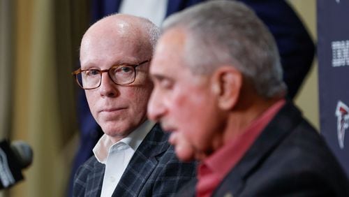 Rich McKay watches as Falcons owner Arthur Blank addresses the media Jan. 8 after the firing of coach Arthur Smith.