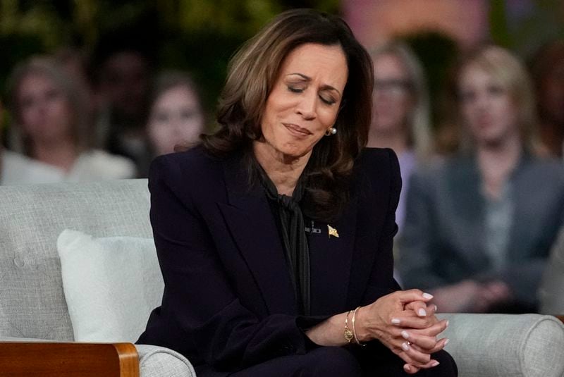 Democratic presidential nominee Vice President Kamala Harris listens to a parent's survivor story as she joins Oprah Winfrey at Oprah's Unite for America Live Streaming event Thursday, Sept. 19, 2024 in Farmington Hills, Mich. (AP Photo/Paul Sancya)