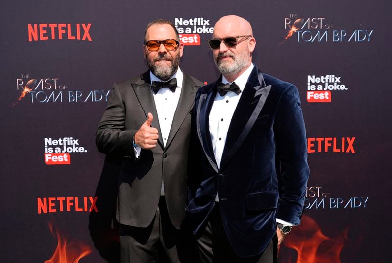 Wise guys: Bert Kreischer (left) with Todd Segura at the roast of Tom Brady in Inglewood, California, in May. Kreischer brings his Fully Loaded comedy festival to Macon on Wednesday, June 12, and Savannah on Friday, June 14.