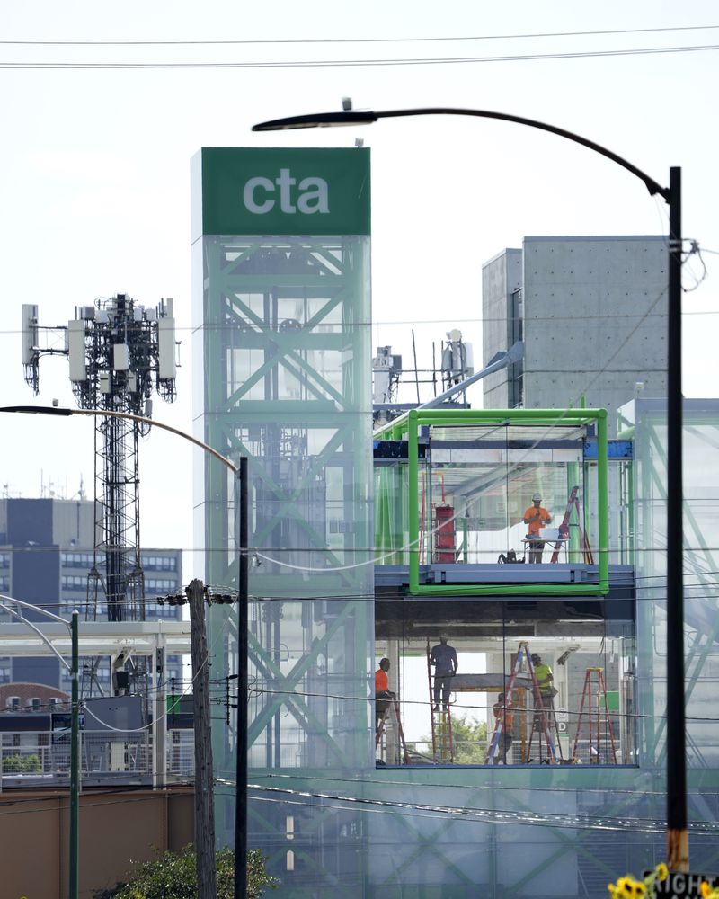 Construction continues on the new Chicago Transit Authority's Damen Ave. Green Line station Sunday, Aug. 4, 2024, near the United Center where the Democratic National Convention will convene Monday, August 19, in Chicago. (AP Photo/Charles Rex Arbogast)