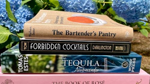 A summer bundle of new drink books.
(Courtesy of Angela Hansberger for The Atlanta Journal-Constitution)