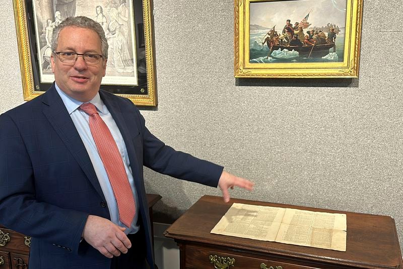 Historian Seth Kaller shows off a 1787 copy of the U.S. Constitution that will be put up for auction on Sept. 28, 2024 at Bruck Auctions in Asheville, N.C., on Thursday, Sept. 5. (AP Photo/Jeffrey Collins)