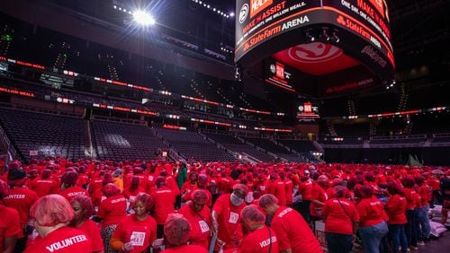 The Atlanta Hawks hosted the Million Meal Pack at State Farm Arena on Saturday, Sept 21, 2024.  Volunteers of all ages filled up 5 shifts of more than 1000 people, where they donated their time in 1 1/2-hour blocks to create the food kits. Several Hawks players took part in the event.  (Jenni Girtman for The Atlanta Journal-Constitution)