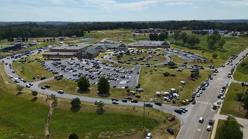 People leave Apalachee High School, Wednesday, Sept. 4, 2024, in Winder, Ga. (AP Photo/Mike Stewart)