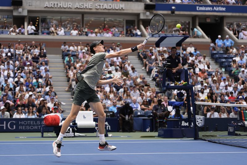 Jannik Sinner, of Italy, returns a shot to Christopher O'Connell, of Australia, during the third round of the U.S. Open tennis championships, Saturday, Aug. 31, 2024, in New York. (AP Photo/Julia Nikhinson)