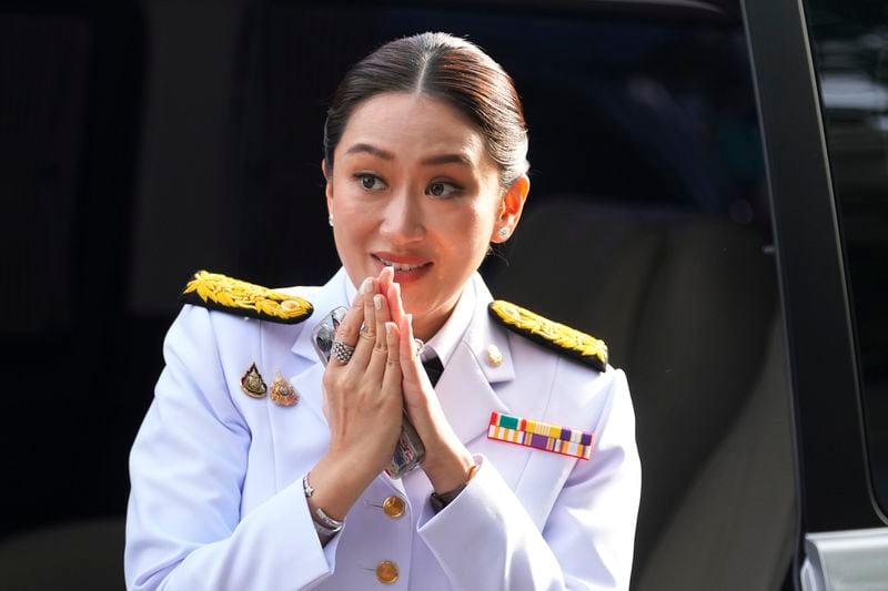 Thailand newly elected Prime Minister Paetongtarn Shinawatra arrives before the royal endorsement ceremony appointing Paetongtarn as Thailand's new prime minister at Pheu Thai party headquarters in Bangkok, Thailand, Sunday, Aug. 18, 2024. (AP Photo/Sakchai Lalit)