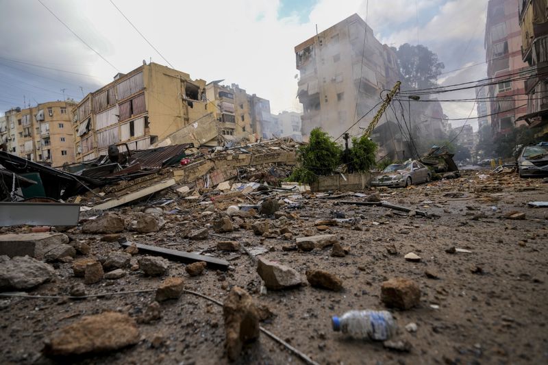 Smoke rises from the site of an Israeli airstrike in Beirut's southern suburb, Lebanon, Tuesday, Oct. 1, 2024. (AP Photo/Hassan Ammar)