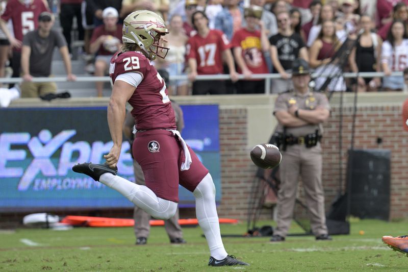 FILE - Florida State punter Alex Mastromanno (29) kicks the ball away during the first half of an NCAA college football game against Syracuse, Saturday, Oct. 14, 2023, in Tallahassee, Fla. (AP Photo/Phelan M. Ebenhack, File)