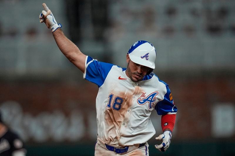 Atlanta Braves' Ramón Laureano (18) celebrates his solo homer against the Washington Nationals in the eighth inning of a baseball game, Saturday, Aug. 24, 2024, in Atlanta. (AP Photo/Mike Stewart)