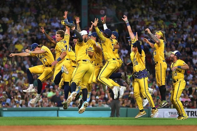 The Savannah Bananas celebrate a run when they took their World Tour to a sold-out Fenway Park on Saturday, June 8, 2024, as they played the Party Animals before over 37,000 fans in Boston. (John Tlumacki/The Boston Globe)