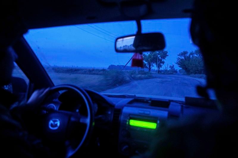 Ukrainian servicemen of 148th separate artillery brigade of the Air Assault Forces drive towards their positions at the frontline in Donetsk region, Ukraine, Wednesday, August 21, 2024. (AP Photo/Evgeniy Maloletka)