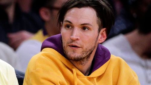 FILE - Musician Josh Klinghoffer attends an NBA basketball game between the Los Angeles Lakers and the Los Angeles Clippers in Los Angeles, March 6, 2014. (AP Photo/Jae C. Hong, File)