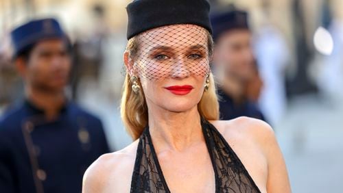 Diane Kruger poses for photographers upon arrival at the Vogue World event on Sunday, June 23, 2024 in Paris. (Photo by Vianney Le Caer/Invision/AP)