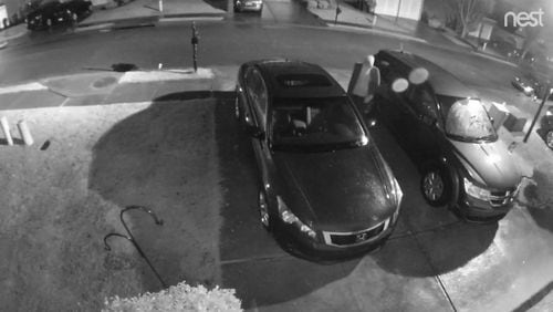 Surveillance footage captured a man accused of breaking into cars and firing several shots at a homeowner who chased him with a bat.