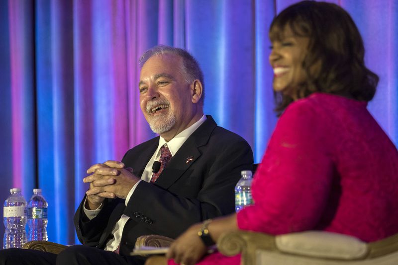 SAVANNAH, GEORGIA - JUNE 10, 2022: Georgia state school superintendent and Republican candidate for re-election Richard Woods, left, speak with moderator Donna Lowry, right, at the Georgia School Board Association Summer conference in Savannah. (Stephen B. Morton for The Atlanta Journal-Constitution).