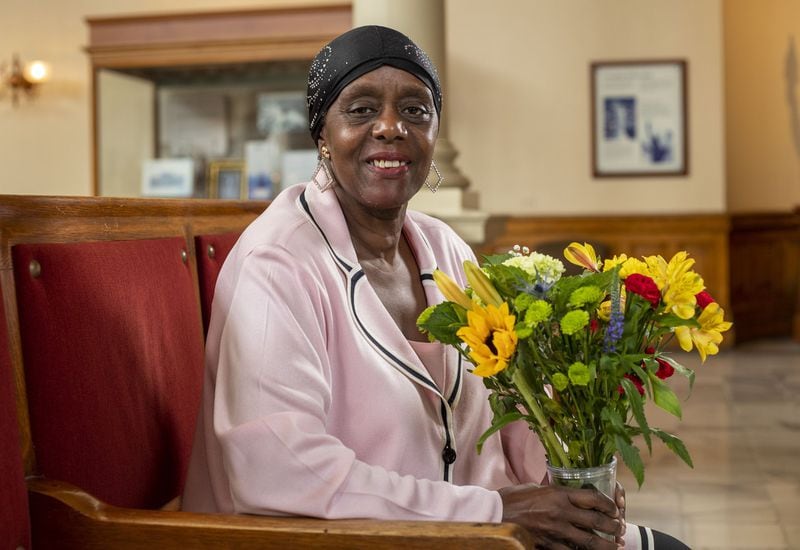 06/26/2020 - Atlanta, Georgia - Georgia Rep. "Able" Mable Thomas holds a toque of flowers she received while sitting for a photo on Sine Die, day 40, of the legislative session in Atlanta, Friday, June 26, 2020. Rep. Mable is retiring after spending more than 15 years as a lawmaker. (ALYSSA POINTER / ALYSSA.POINTER@AJC.COM)