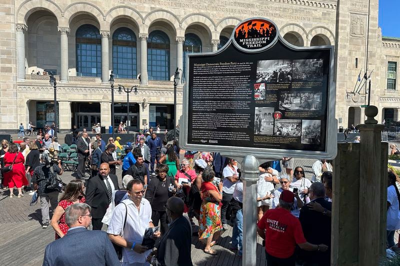 A newly unveiled Mississippi Freedom Trail marker on the boardwalk in front of Boardwalk Hall in Atlantic City, N.J., Tuesday, Aug. 20, 2024, commemorates Fannie Lou Hamer, a leader of the Mississippi Freedom Democratic Party, whose speech at the 1964 Democratic National Convention mesmerized the nation. (AP Photo/Ted Shaffrey)