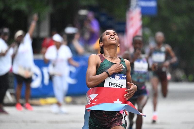 Fotyen Tesfay wins Elite Women’s division of the 54th running of the Atlanta Journal-Constitution Peachtree Road Race in Atlanta on Tuesday, July 4, 2023.   (Hyosub Shin / Hyosub.Shin@ajc.com)