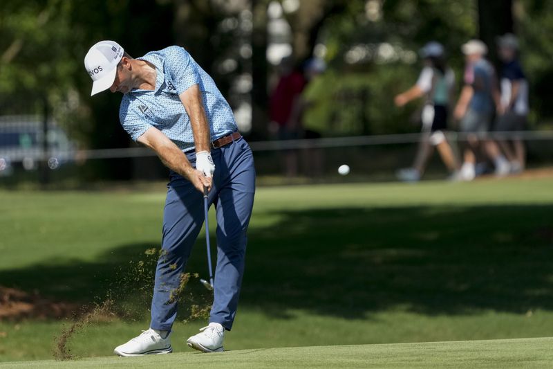 Denny McCarthy hits from the ninth fairway during the second round of the St. Jude Championship golf tournament Friday, Aug. 16, 2024, in Memphis, Tenn. (AP Photo/Mark Humphrey)