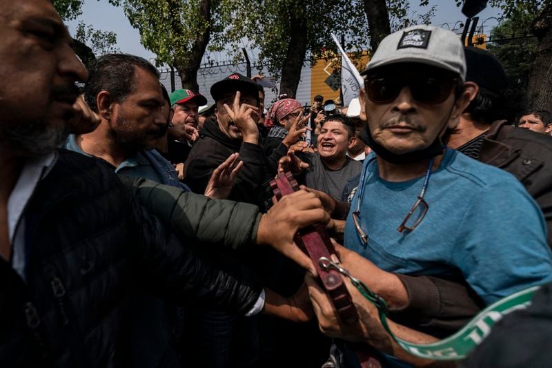 Clashes break out as protesters block entrances to Congress over constitutional reform proposals that would make judges stand for election in Mexico City, Tuesday, Sept. 3, 2024. (AP Photo/Felix Marquez)