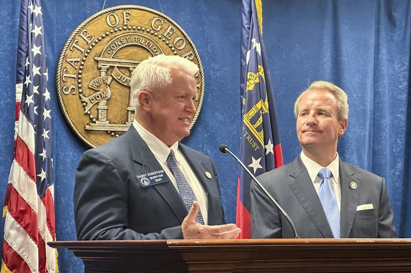 State Sen. Randy Robertson (left) a Republican from Cataula, speaks at a recent news conference about the Fulton County Jail as state Sen. John Albers, a Roswell Republican, listens.