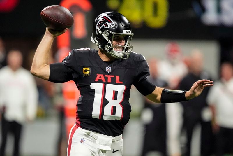 Atlanta Falcons quarterback Kirk Cousins (18) works in the pocket against the Kansas City Chiefs during the first half of an NFL football game, Sunday, Sept. 22, 2024, in Atlanta. (AP Photo/Brynn Anderson)