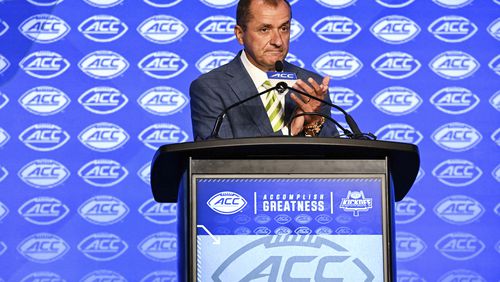 Atlantic Coast Conference commissioner Jim Phillips speaks during an NCAA college football news conference at the ACC media days, Monday, July 22, 2024, in Charlotte, N.C. (AP Photo/Matt Kelley)