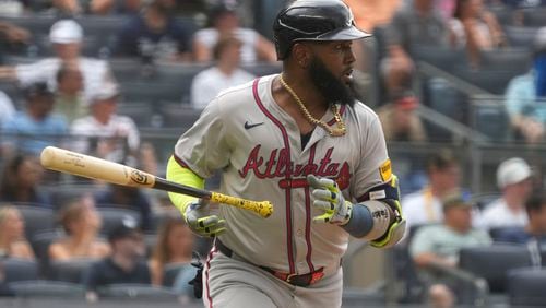 Atlanta Braves' Marcell Ozuna drops his bat and runs to first base after hitting a single during the eighth inning of a baseball game against the New York Yankees, Sunday, June 23, 2024, in New York. (AP Photo/Pamela Smith)