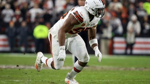FILE - Cleveland Browns defensive end Myles Garrett (95) runs off of the line of scrimmage during an NFL football game against the New York Jets, Thursday, Dec. 28, 2023, in Cleveland. (AP Photo/Kirk Irwin, File)