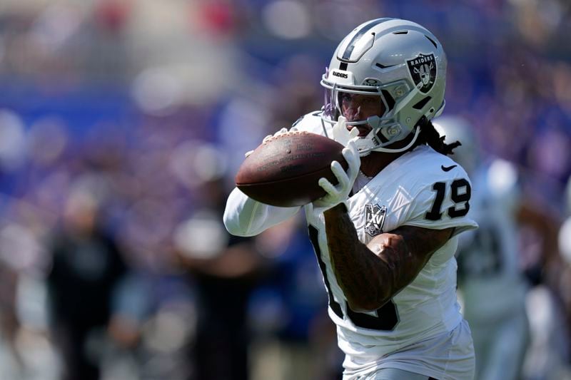 Las Vegas Raiders wide receiver DJ Turner (19) catches a pass against the Baltimore Ravens during the first half of an NFL football game, Sunday, Sept. 15, 2024, in Baltimore. (AP Photo/Stephanie Scarbrough)