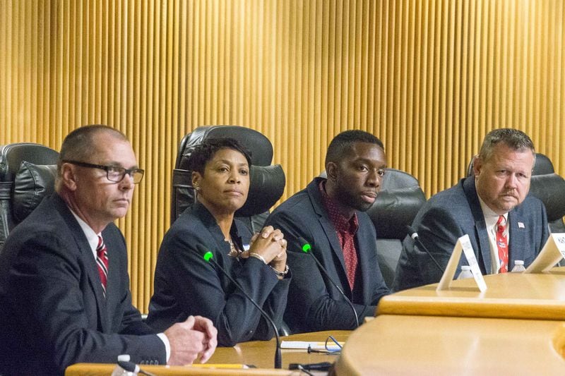 Gwinnett County School Board candidates Steven Knudsen (from left), Wandy Taylor (second from left), Everton "E.J." Blair, Jr. and C. Chuck Studebaker participate in a forum at the Gwinnett Justice and Admin Center Auditorium, Tuesday, October 16, 2018.  (ALYSSA POINTER/ALYSSA.POINTER@AJC.COM)