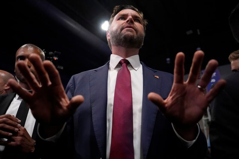 Republican vice presidential nominee Sen. JD Vance, R-Ohio, speaks to reporters in the spin room after a presidential debate between Republican presidential nominee former President Donald Trump and Democratic presidential nominee Vice President Kamala Harris, Tuesday, Sept. 10, 2024, in Philadelphia. (AP Photo/Matt Slocum)