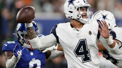 Dallas Cowboys quarterback Dak Prescott (4) passes against the New York Giants during the second quarter of an NFL football game, Thursday, Sept. 26, 2024, in East Rutherford, N.J. (AP Photo/Adam Hunger)