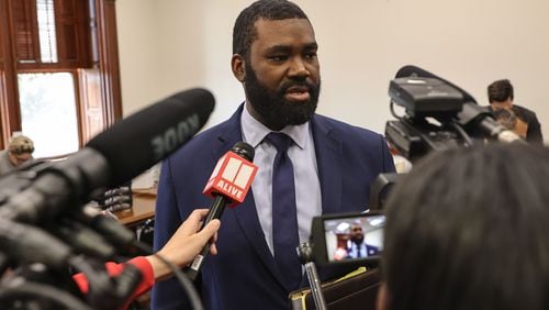 Christian Wise Smith talks to the media after filing paperwork to qualify as a candidate for Fulton County District Attorney at the Georgia State Capitol on Friday, March 8, 2024. (Natrice Miller/ Natrice.miller@ajc.com)