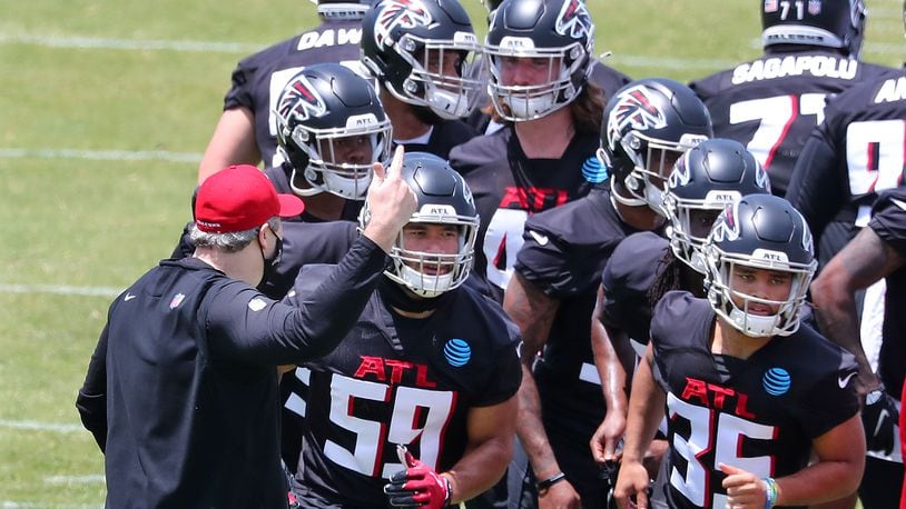 Atlanta Falcons tight end John Raine (89) walks off the field