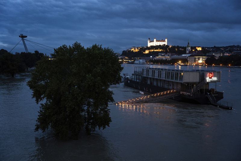 View of the Bratislava castle as the water level of the Danube river rises during recent floods in Slovakia, Monday, Sept. 16, 2024. (AP Photo/Tomas Hrivnak)