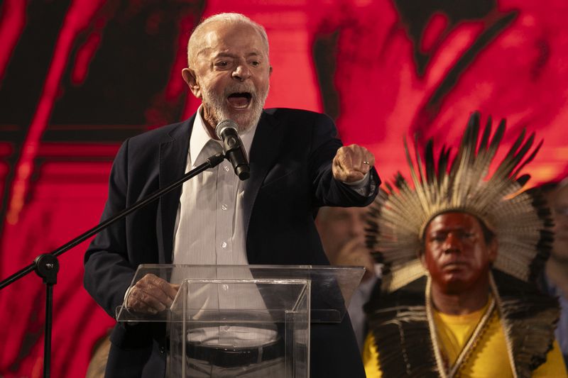 Brazil's President Luiz Inacio Lula da Silva speaks during a ceremony celebrating the return of the sacred cloak of the Indigenous Tupinamba people to Brazil, in Rio de Janeiro, Thursday, Sept. 12, 2024. The garment, made from bird feathers and plant fibers, was repatriated to Brazil after having spent more than 300 years in the National Museum of Denmark. (AP Photo/Bruna Prado)