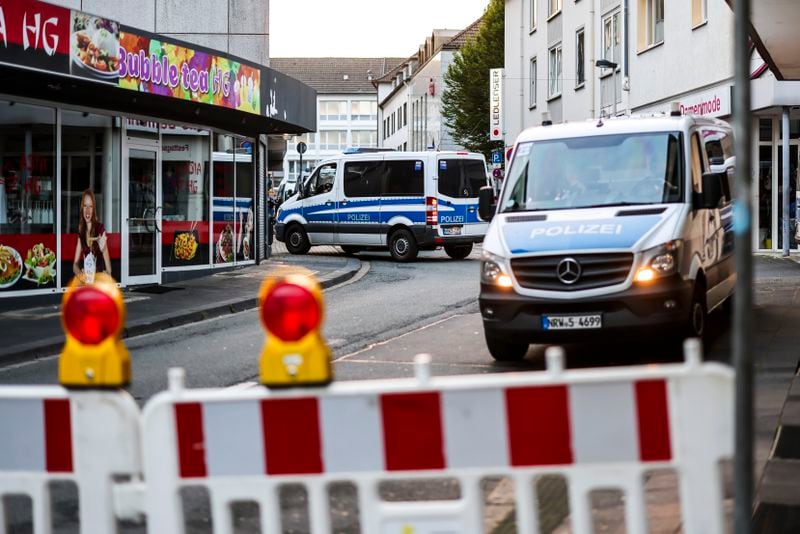 Police cars sit at a cordon early Saturday, Aug. 24, 2024, after several people were killed and injured in an attack at the Solingen's 650th anniversary celebrations late Friday. (Christoph Reichwein/dpa via AP)