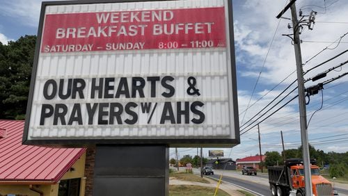 Community support sign for Apalachee High School is displayed outside the Golden Corral Buffet & Grill on East May Street after two students and two teachers were gunned down on the school grounds in Winder. (Hyosub Shin / AJC)