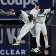 New York Yankees left fielder Alex Verdugo, left, center fielder Aaron Judge, center, and Juan Soto celebrate after beating the Kansas City Royals in Game 1 of the American League baseball division series, Saturday, Oct. 5, 2024, in New York. (AP Photo/Adam Hunger)