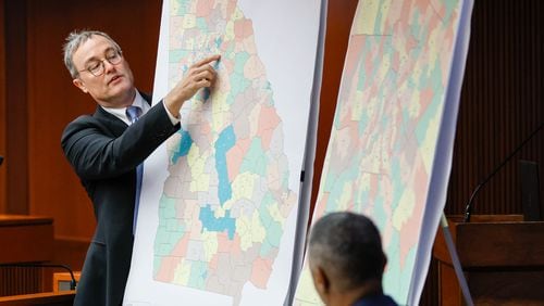 Lawyer Bryan Sells points at the Democrats’ proposed redistricting map during the second day of a Reapportionment and Redistricting Committee hearing at the Georgia State Capitol on Thursday, Nov. 30, 2023. (Miguel Martinez/miguel.martinezjimenez@ajc.com)