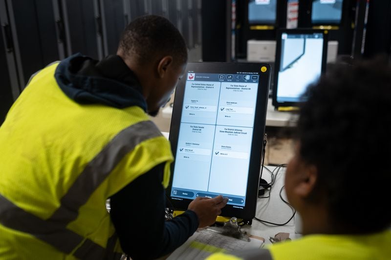 Dekalb County Elections officals conduct logic and accuracy testing of Dominion voting machines.  Monday, Sept. 16, 2024 (Ben Hendren for the Atlanta Journal-Constitution)