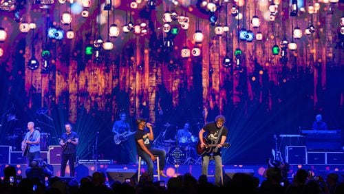 Hootie and the Blowfish, with Darius Rucker (center) and Mark Bryan (right), roll into Atlanta on the Summer Camp with Trucks Tour on Friday, Sept. 20. The South Carolina hitmakers will be joined at Ameris Bank Amphitheatre by Collective Soul and Edwin McCain.